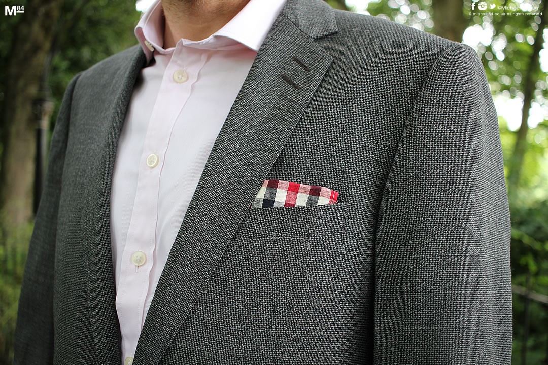 Wear a tie and pocket square with your suit to a wedding