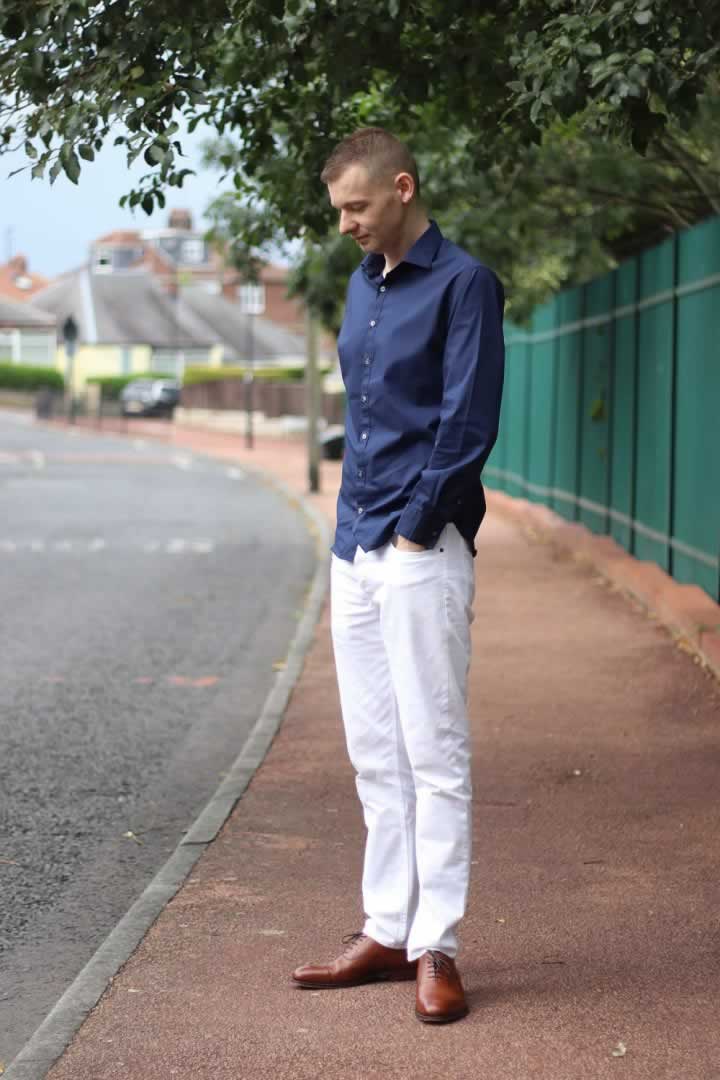 Smart casual shirts - I am wearing a navy shirt, white jeans and brown Loake Oxford shoes as part of a smart casual outfit.