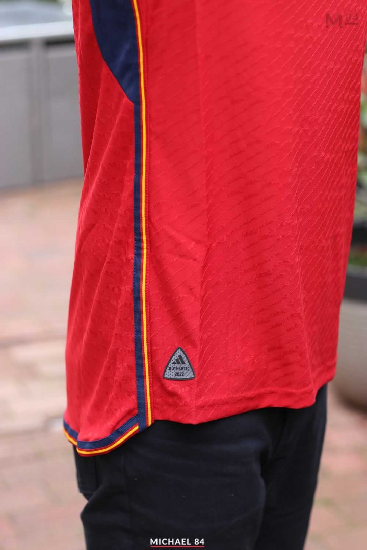 Wearing Spain Home Shirt 2022 By Adidas - Side View Michael 84